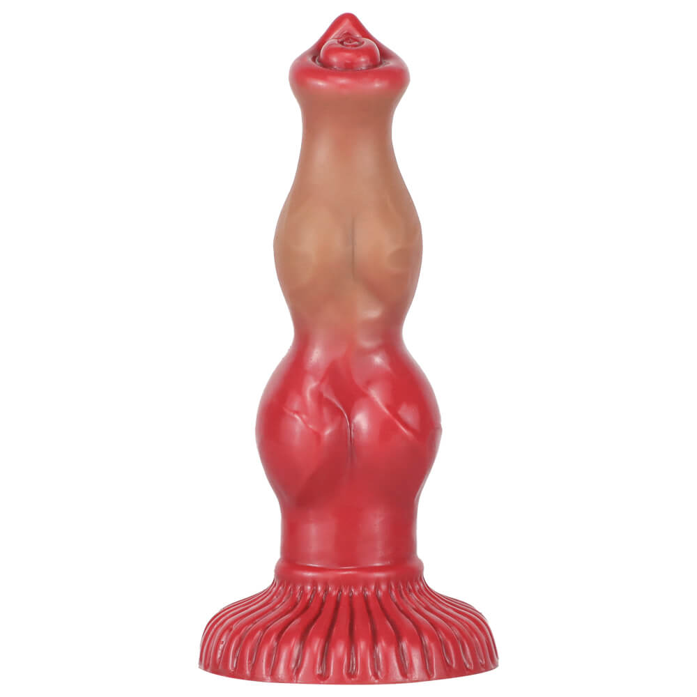 9 inch fantasy dog knot dildo standing upright on white background.