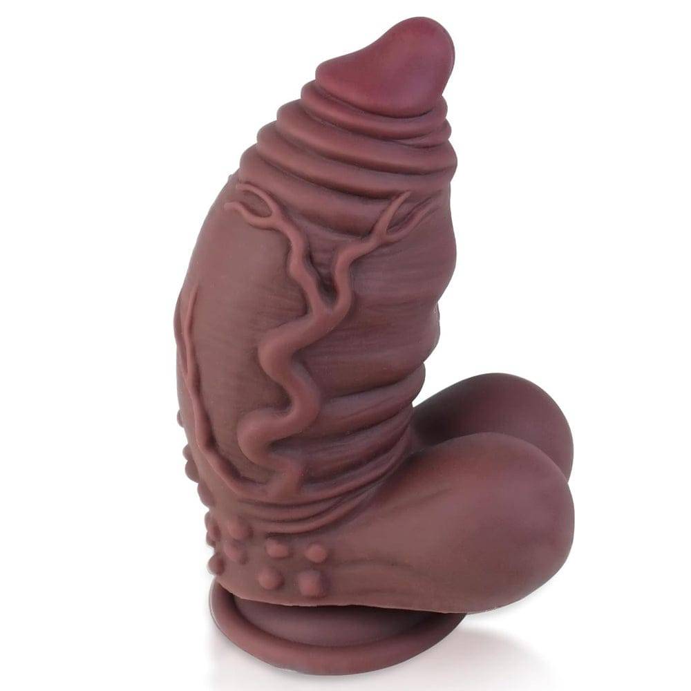 The ugly huge extra thick realistic dildo on a white background.